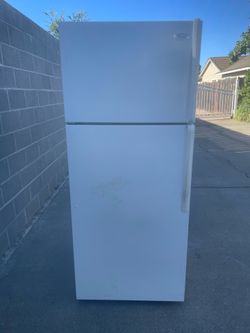 Whirlpool top and bottom refrigerator for $170. Dimensions are 28Wx29Dx67H. Pick up only.