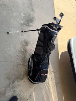 Taylor made golf bag with clubs