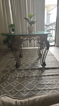 Elegant Glass Dining Table with Wrought Iron Base