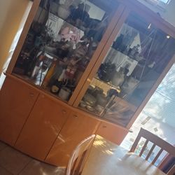 OAK DINNING CABINET WITH LARGE TABLE AND 6 CHAIRS 