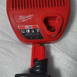 MILWAUKEE M12 BATTERY 6.0 PLUS CHARGER NEW