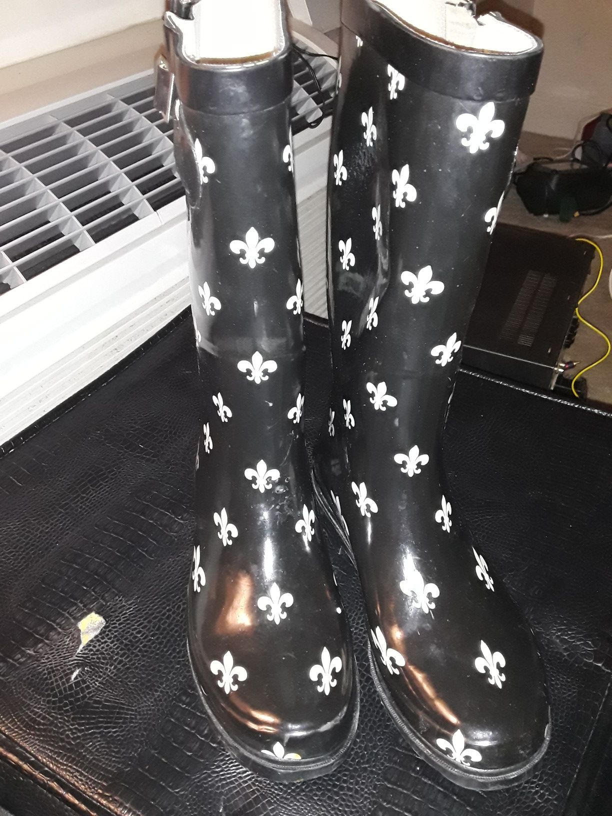 Black and white rain boots