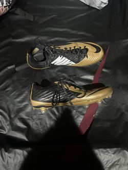 Gold nike football cleats size 12