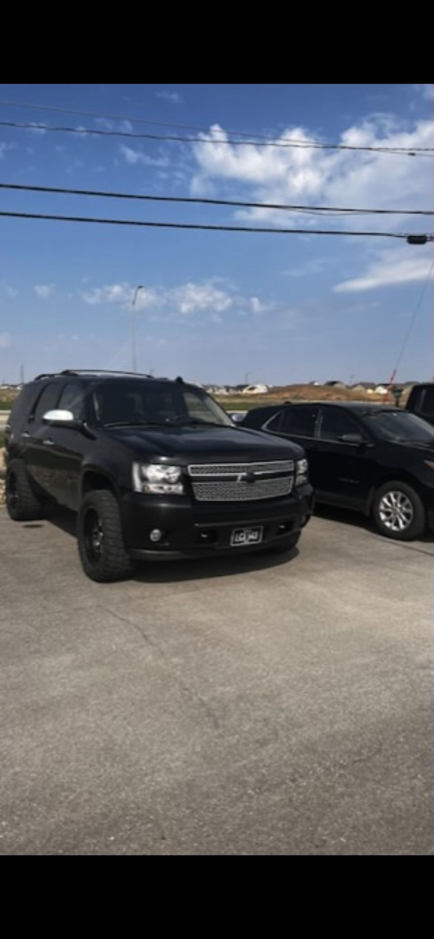 2011 Black Tahoe Ltz Running Boards & Air Box