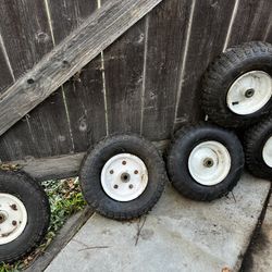 4 Wheelbarrow Tires And Rims. $5 For All