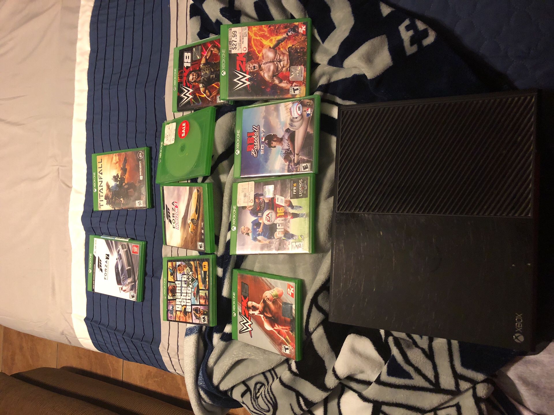 Xbox one with 3 remote good condition and 10 games