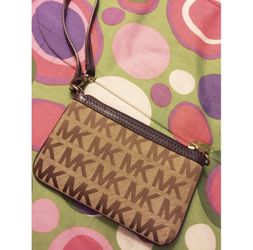 Michael Kors purple wristlet wallet