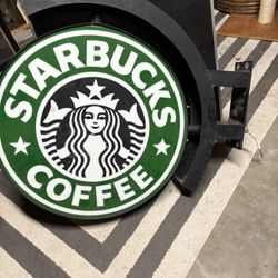 Signs. (Starbucks Sign )