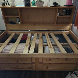 Twin bed with drawers / storage and a bookshelf.  Bed only, NO mattress!  YES, IT'S AVAILABLE!!!