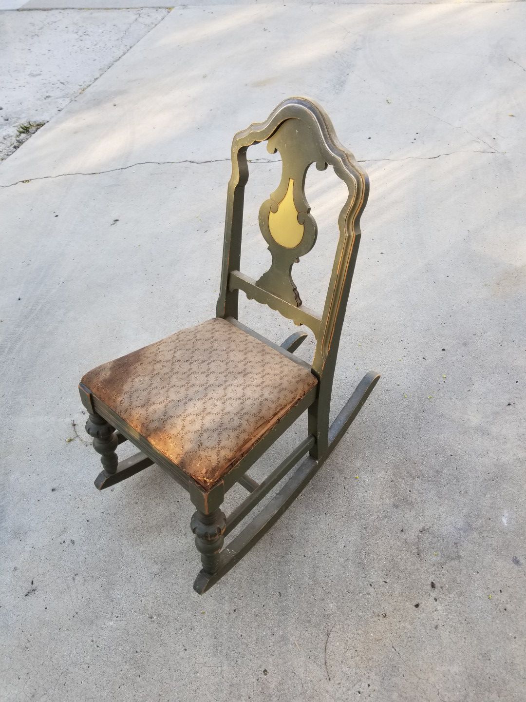 Very old antique kids rocking chair.