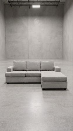 Living Spaces Grey Reversible Sectional