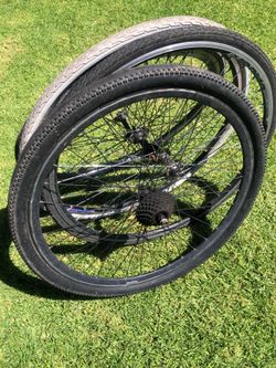 Rims and tires 3 front 700 c one 27” back $20