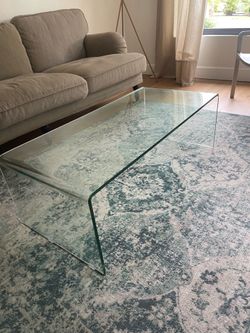 Glass coffee table.