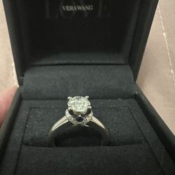 Vera Wang 1.5 ct. solitaire natural diamond ring with accent diamond and two princess cut sapphires.  Total 1.63 ct. diamonds.  