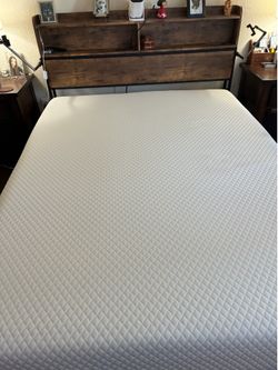 Qween bed frame and mattress and headboard.