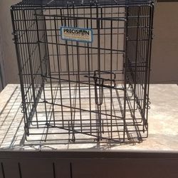 Folding dog crate 24 in Long by 17 in wide $30