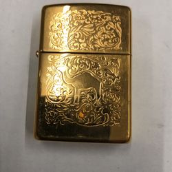 18 karat gold, plated camel Joe zippo, never lit