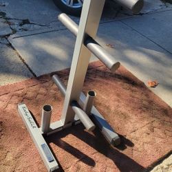 BODY SOLID PLATE TREE WITH 2 BAR HOLDERS. EXCELLENT CONDITION 
11525 S HALSTED DUNKIN DONUTS/7111.S WESTERN WALGREENS 
90$ CASH ONLY AS IS