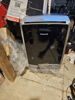 14,000 BTU Heat and Cool Portable Air Conditioner, Dehumidifier and Fan