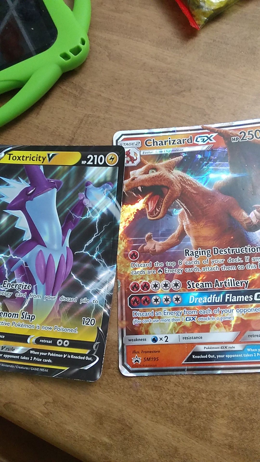 Two large Pokemon cards