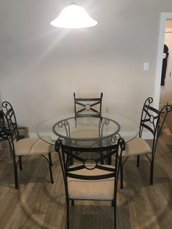 Glass Circular Dining Table with Four Chairs
