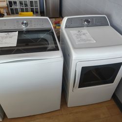 $978(MSRP$1898) GE Profile SMART Energy STAR Top Load Washer and Front Load Electric Dryer in White 