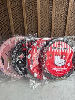 Hello kitty steering wheel covers new $25 each