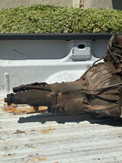 Open drive 3 speed transmission off 250 Chevy engine