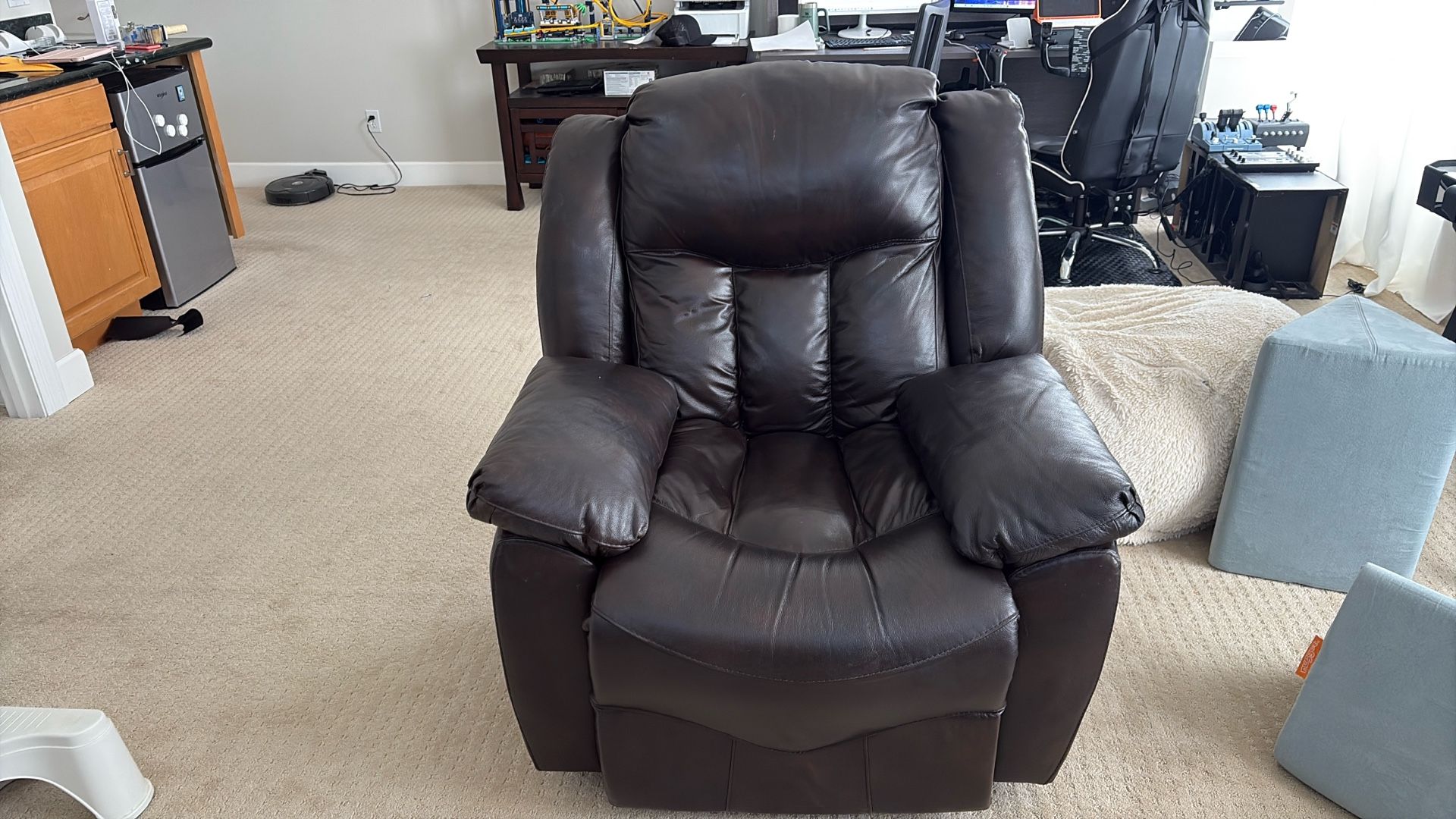Brown leather Rocker/recliner 