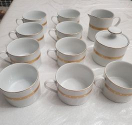 11 new gold plated teacups