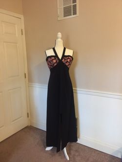 Ladies black and pink mini gown by STAR DANCE size 9/10.