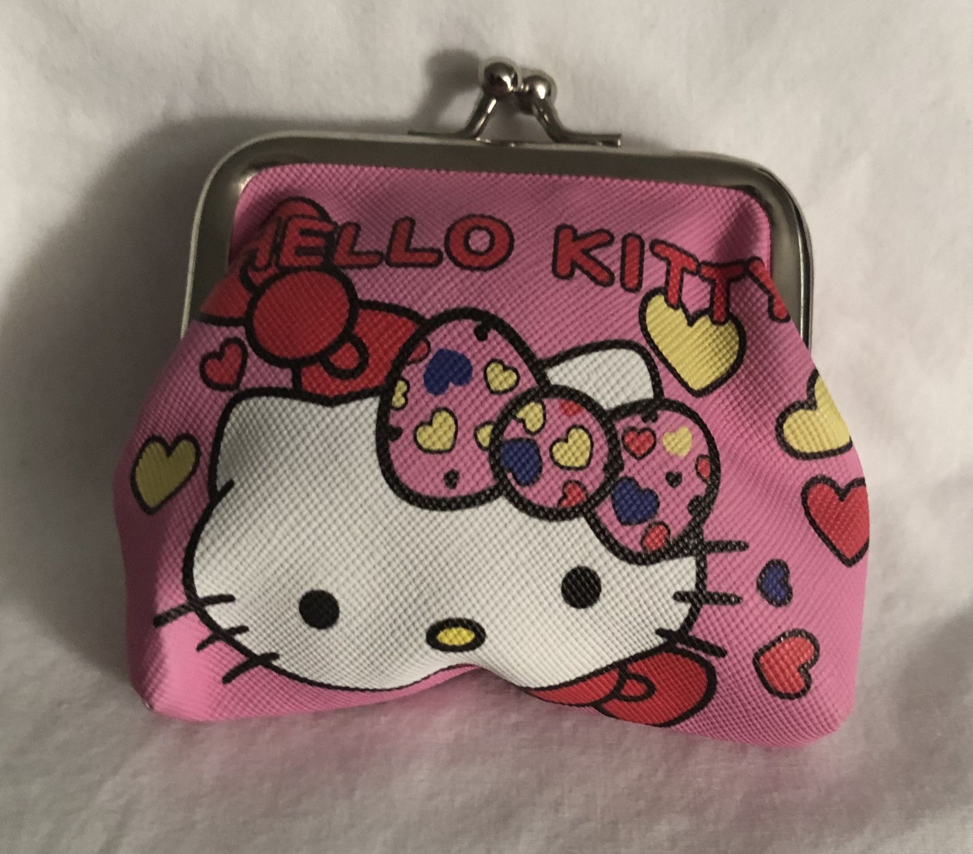 Hello Kitty coin purse Hello Kitty hearts graphics pink.4”X3-1/2”