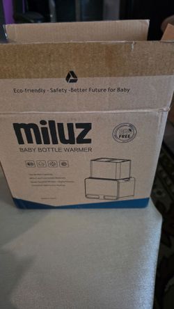 Milk bottle warmer