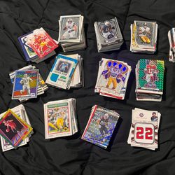 Football, Basketball and few baseball cards. All in great condition. Plenty of rookie cards and numbered/special cards. Price is per 30-35 cards