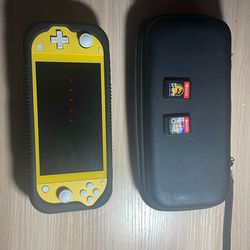 Nintendo switch Lite With charger, case, grip , and 2 games