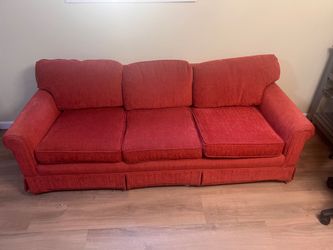 red fabric couch
