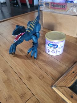 BONITO  Jugete De Dinosaurio..$1.