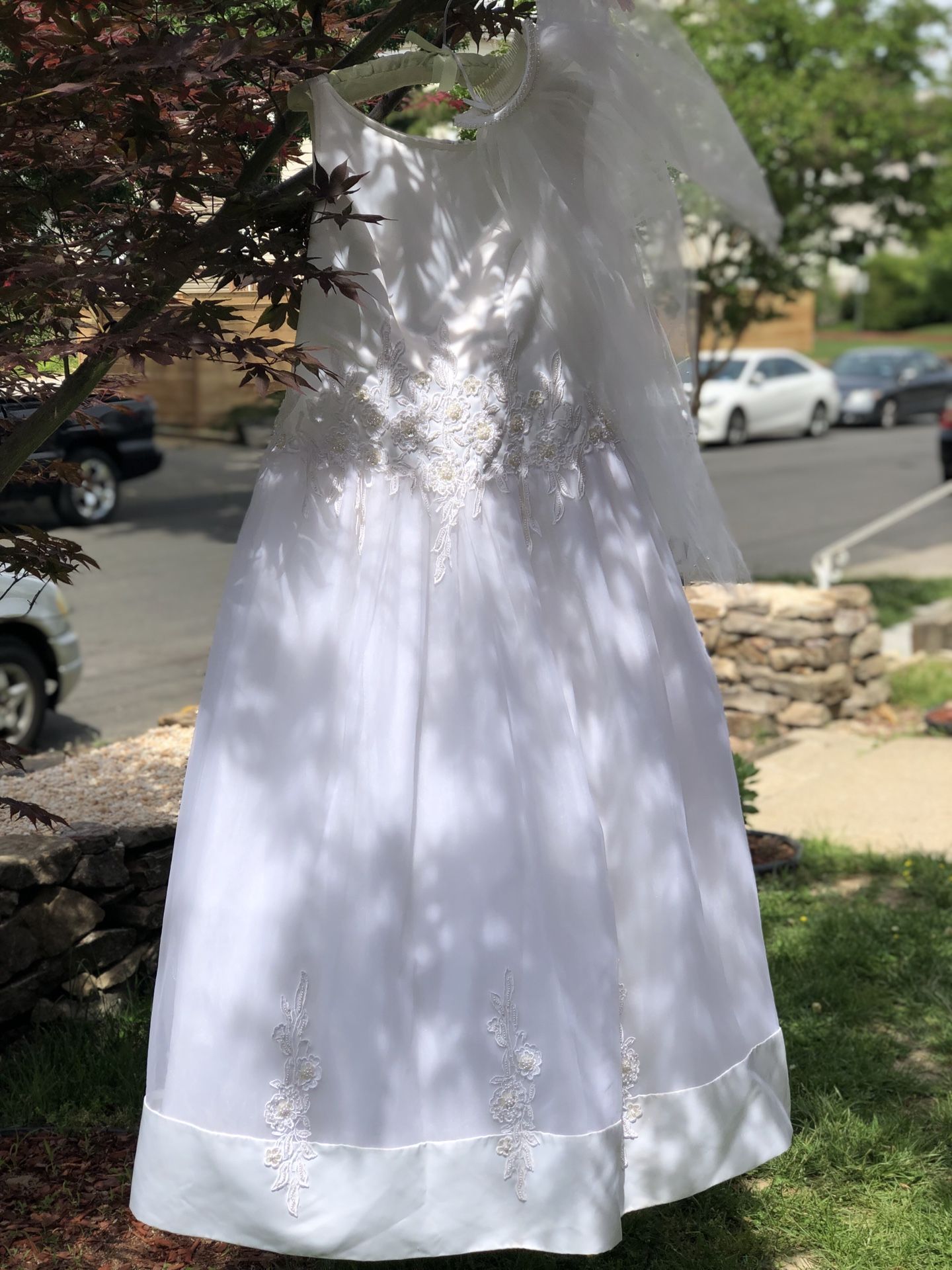 Wedding dress size 16, veil and satin shoe size 9.5.