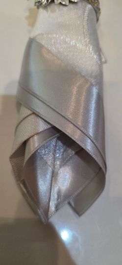 Napkin rings, napkins, and table cover