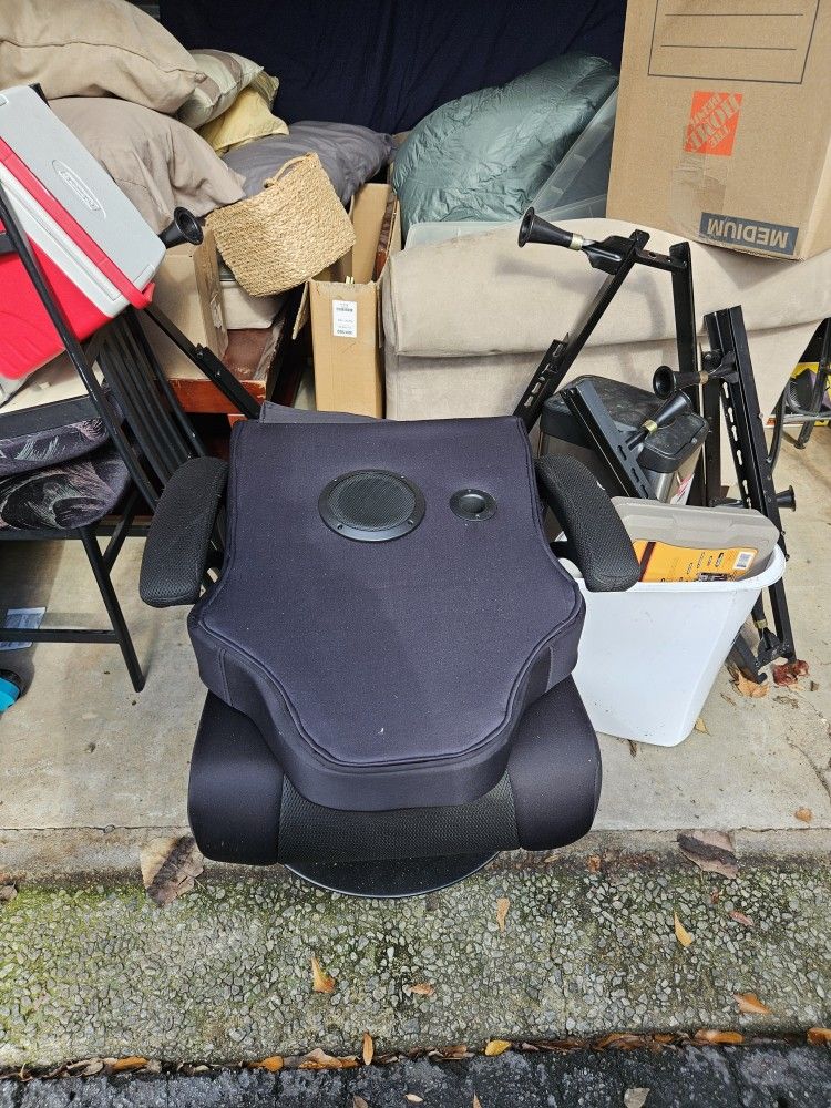 black gaming chair on a swivel