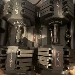 Selling like new adjustable dumbbells 10-55lbs