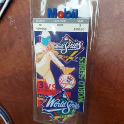 1999 World Series Game 3 ticket, plastic sleeve & lanyard. 