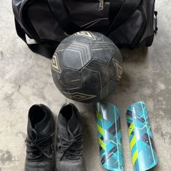 Soccer Cleats, Shin Guards, Ball, And Bag