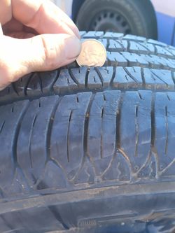205/70R15 Americus Tire on 15" Steel Rim – Good Tread!