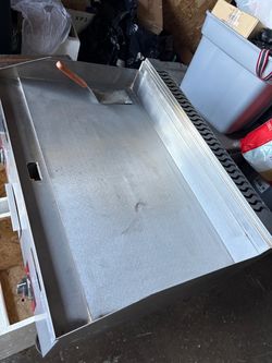 Plancha para cocinar es comercial