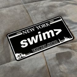 swim> Novelty Plate (NY)