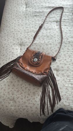 Brown fringe cross body bag