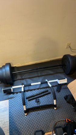 Adjustable barbell, pull up bar, and exercise ball