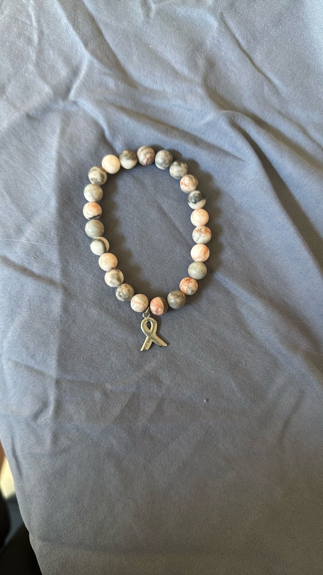 Breast cancer and Cool jaguar gold bracelet!