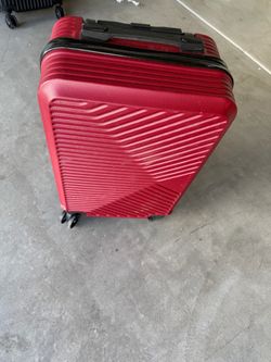 Red carry on suitcase